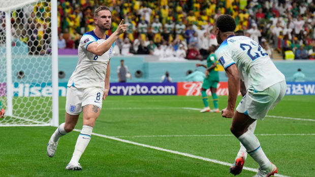 Jordan Henderson celebrates a goal for England.